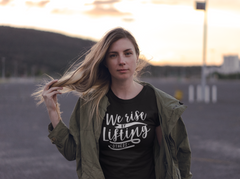 We Rise By Lifting Others - Cotton T-Shirt